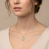 Green aquamarine baguette and diamond necklace