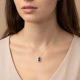 Gold necklace with baguette sapphire and diamonds