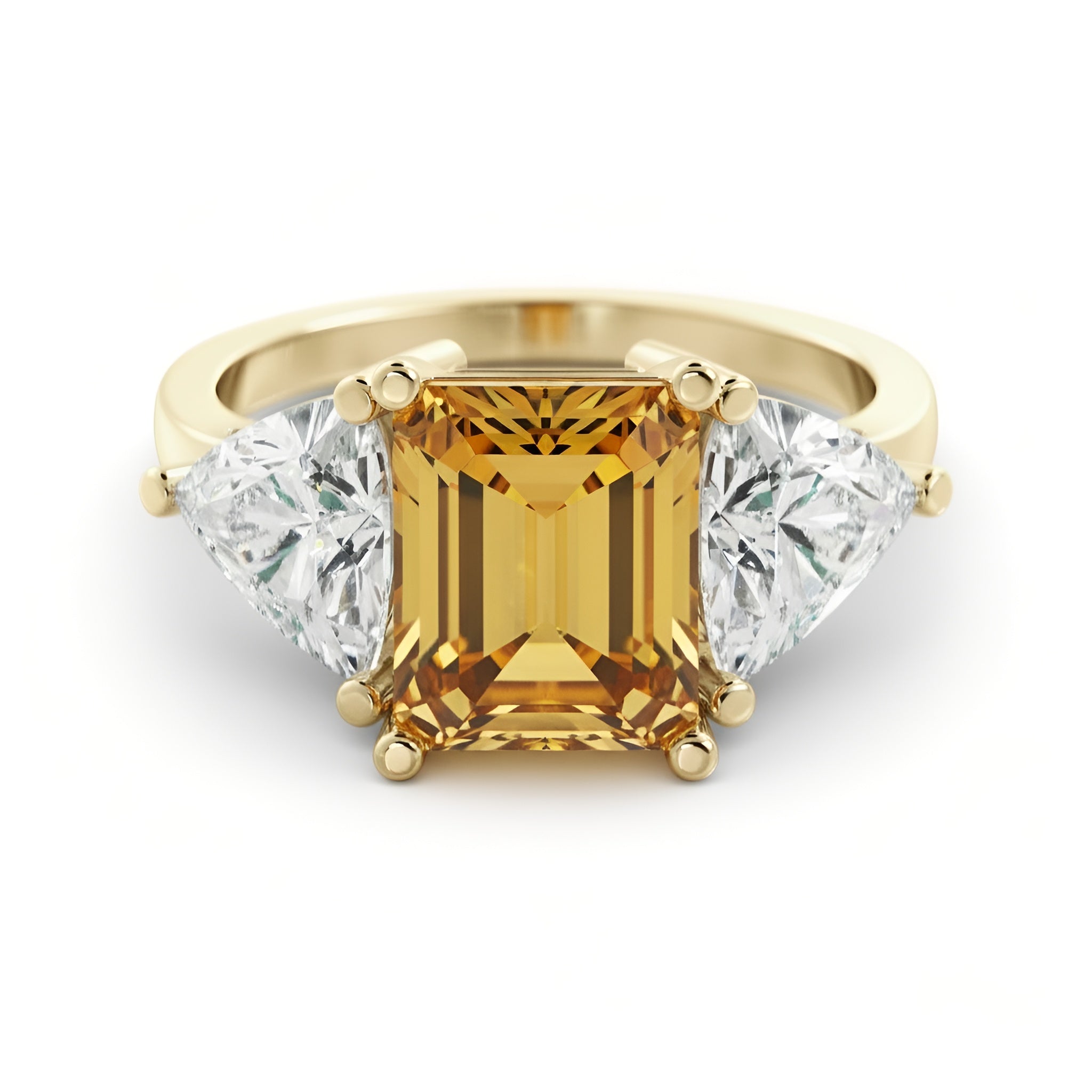 A gold ring with a large yellow gemstone in the center, flanked by two smaller diamonds on either side.