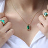 Emerald baguette gold necklace and diamonds