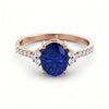 Gold ring set with 2.51 carat emerald and diamonds