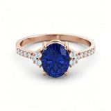 Gold ring set with 2.51 carat emerald and diamonds