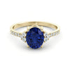 Gold ring set with 2.51 carat emerald and diamonds