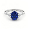 Gold ring set with 2.51 carat emerald and diamonds
