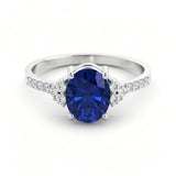 Gold ring set with 2.51 carat emerald and diamonds