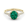 Gold ring set with 2.51 carat emerald and diamonds