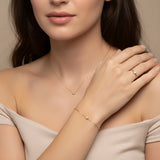Single diamond gold bracelet
