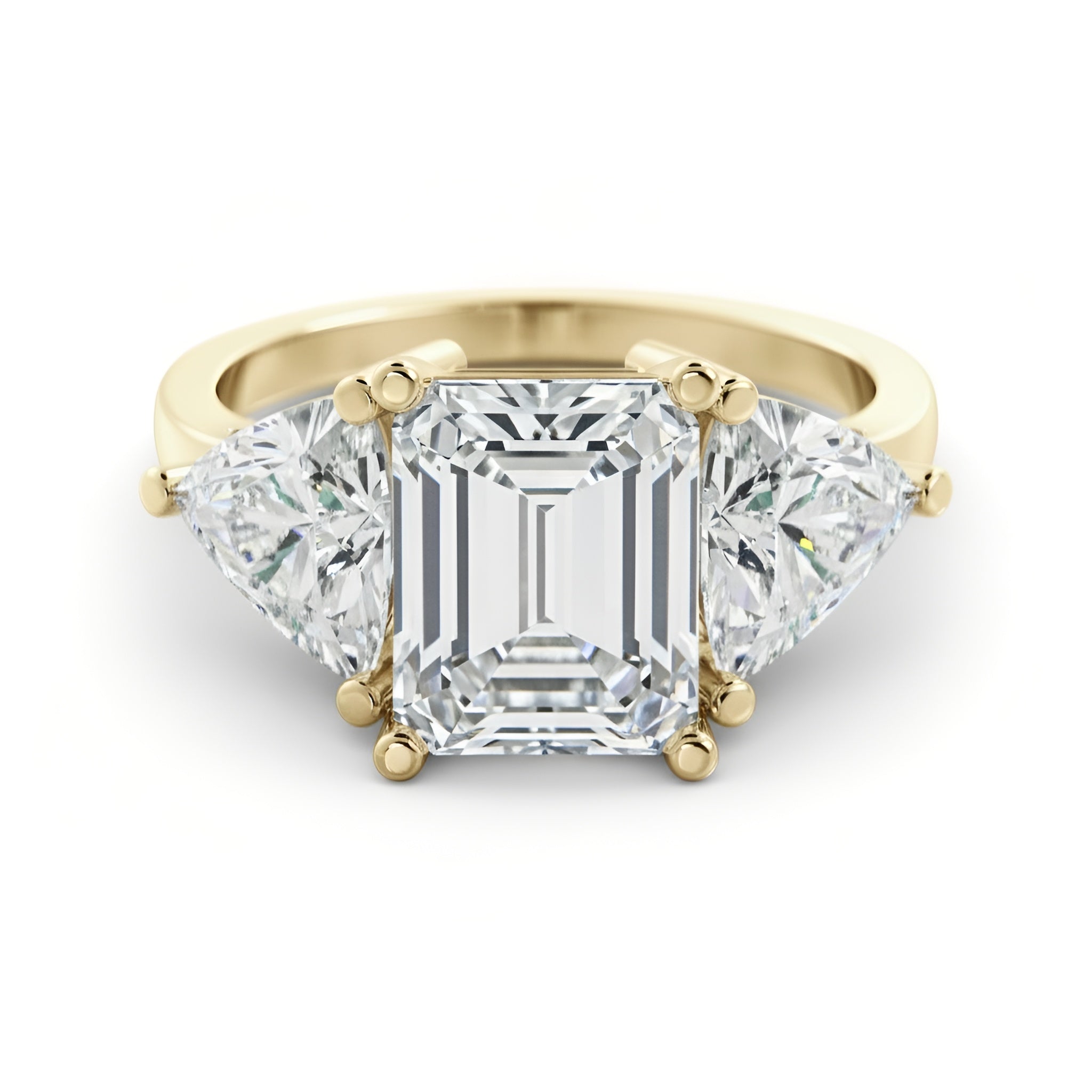 A gold ring with a large, clear gemstone in the center, surrounded by smaller diamonds on either side.