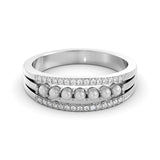 A classic diamond and pearl ring