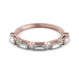 Delicate baguette and diamond Moissanite ring