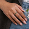 Delicate emerald baguette and diamond ring