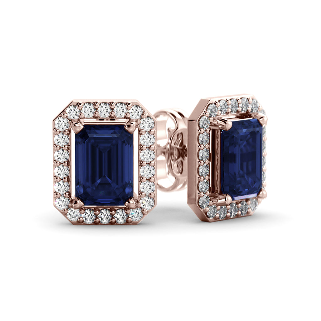 A pair of Halo sapphire and diamond earrings