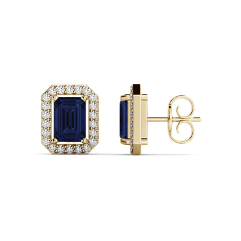 A pair of Halo emerald and diamond earrings
