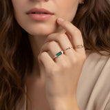 Emerald and diamond baguette ring