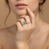 Double Halo emerald-diamond ring