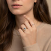 A delicate signet ring set with sapphires and diamonds
