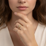 A delicate signet ring set with citrine and diamonds