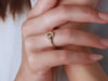 A delicate signet ring set with citrine and diamonds